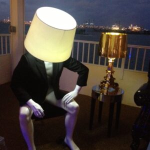 Humanoid male sitting